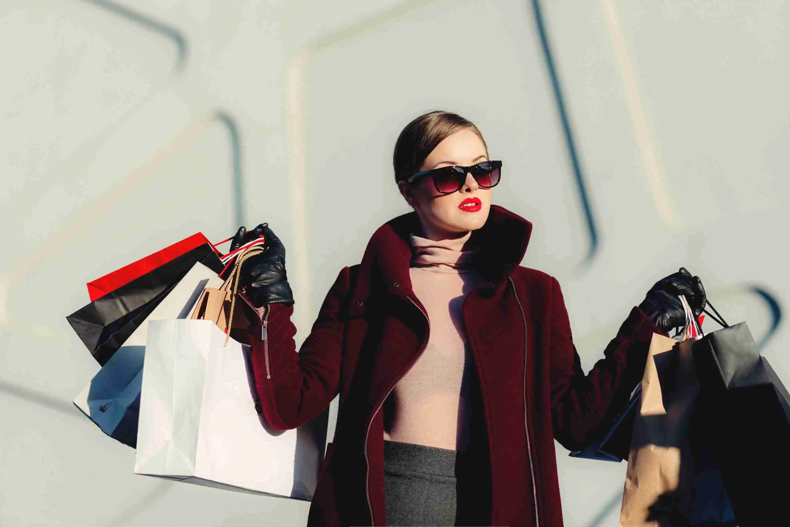 Shopping bags carried along a retail street
